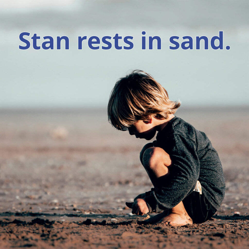 Sand reader image of boy playing in sand